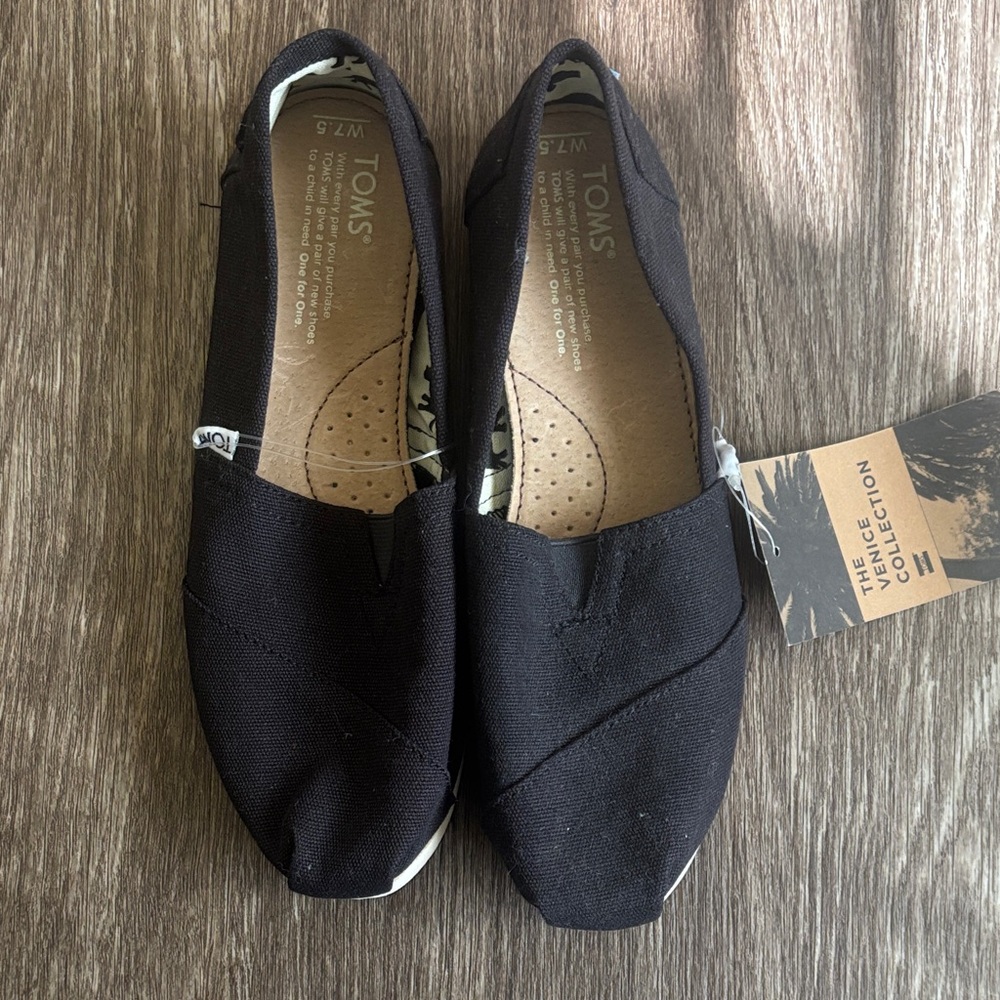 TOMS Classic Black Canvas Slip-Ons